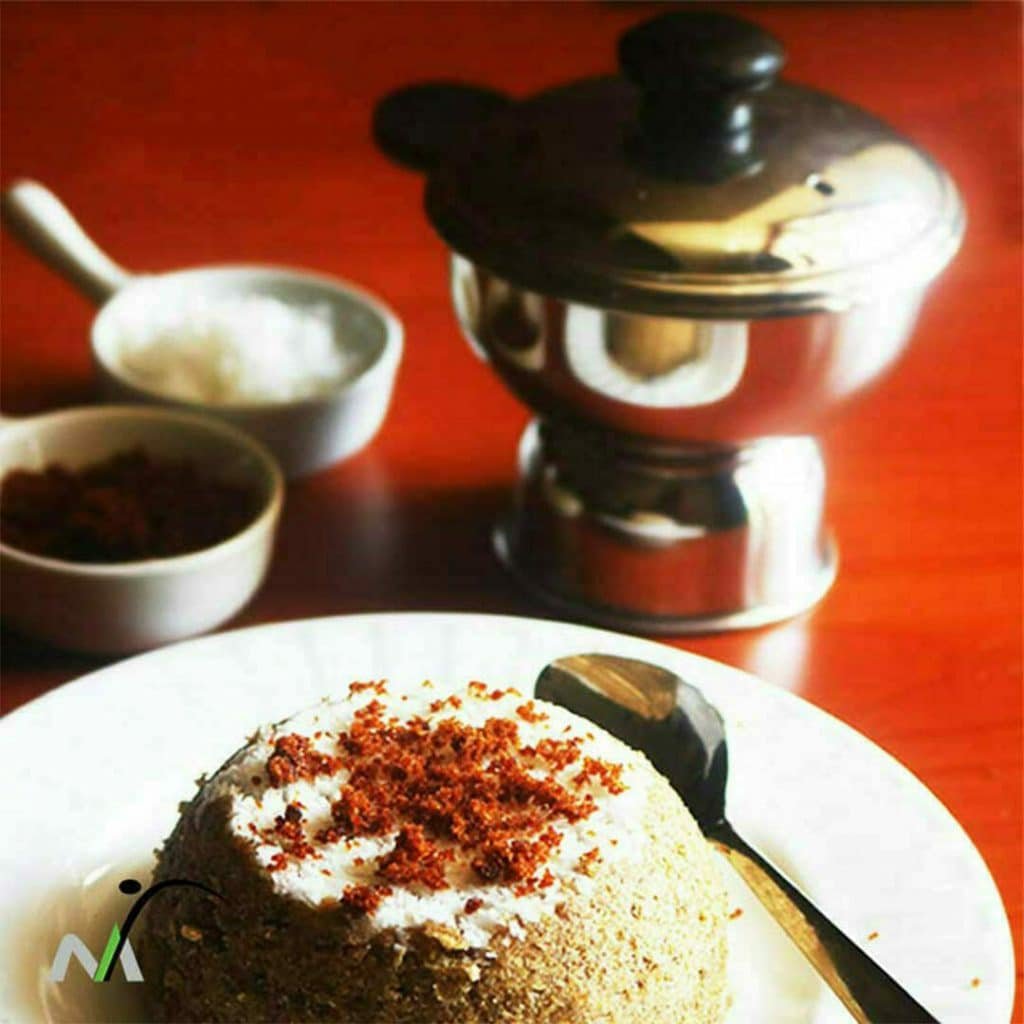 Puttu maker on pressure cooker top