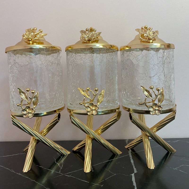 3-piece glass canister set with gold accents