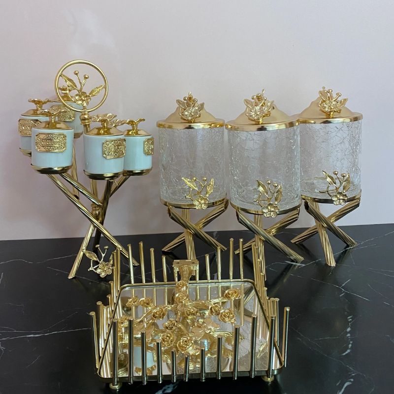 3-piece glass canister set with gold accents