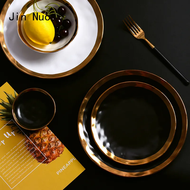 matte black ceramic plates with gold trim (2)